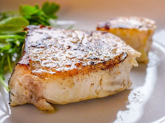 Pan-fried swordfish with lemon garlic salmoriglio sauce